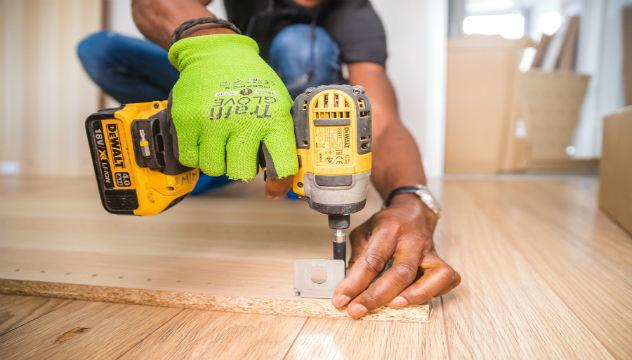 Handyman Using an Electric Drill